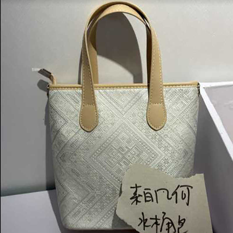 素白几何黄边水桶包